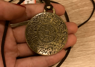 an amulet for happiness, money and success